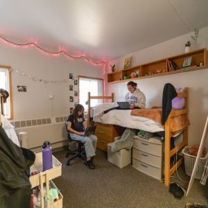 two roommates hanging out in a suite in Gabaldon