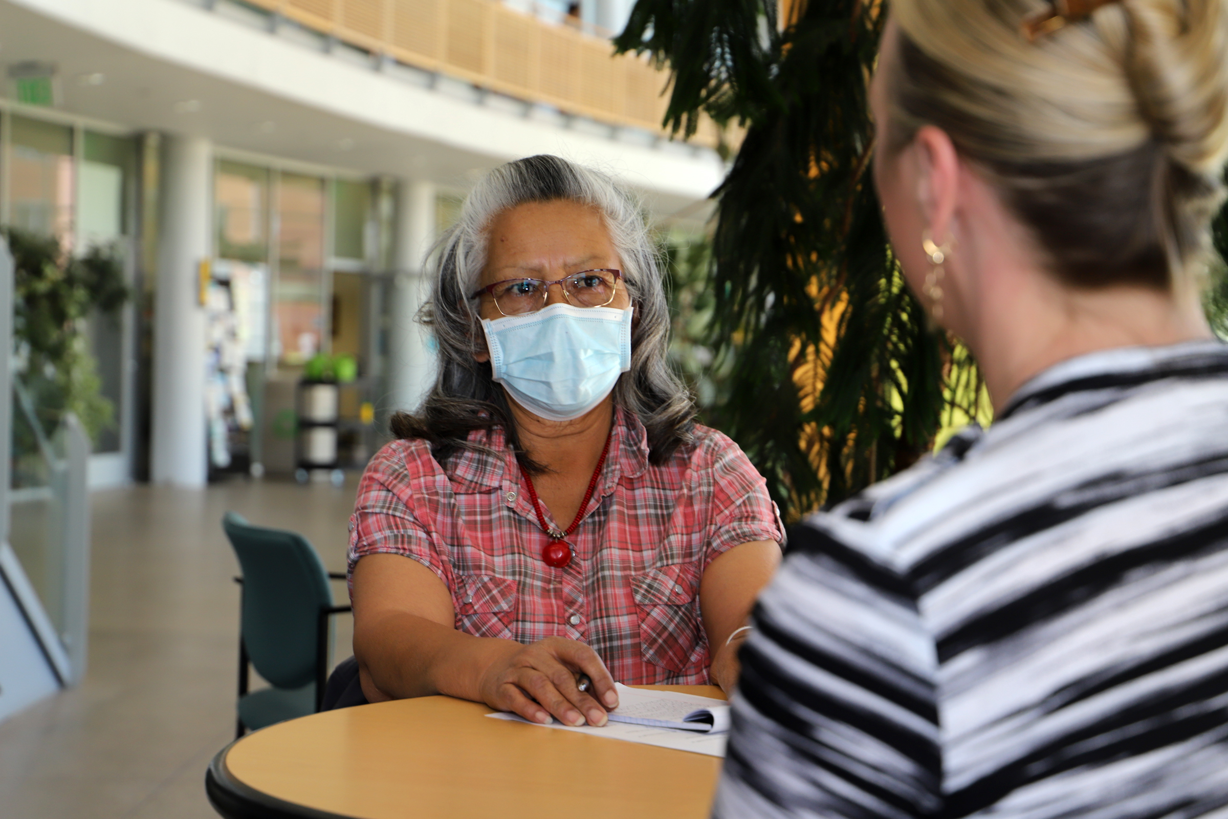 Stephanie Hyeoma meeting with project coordinators at Northern Arizona University to discuss aspects of the project. 