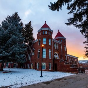 old main with glowing orange sky
