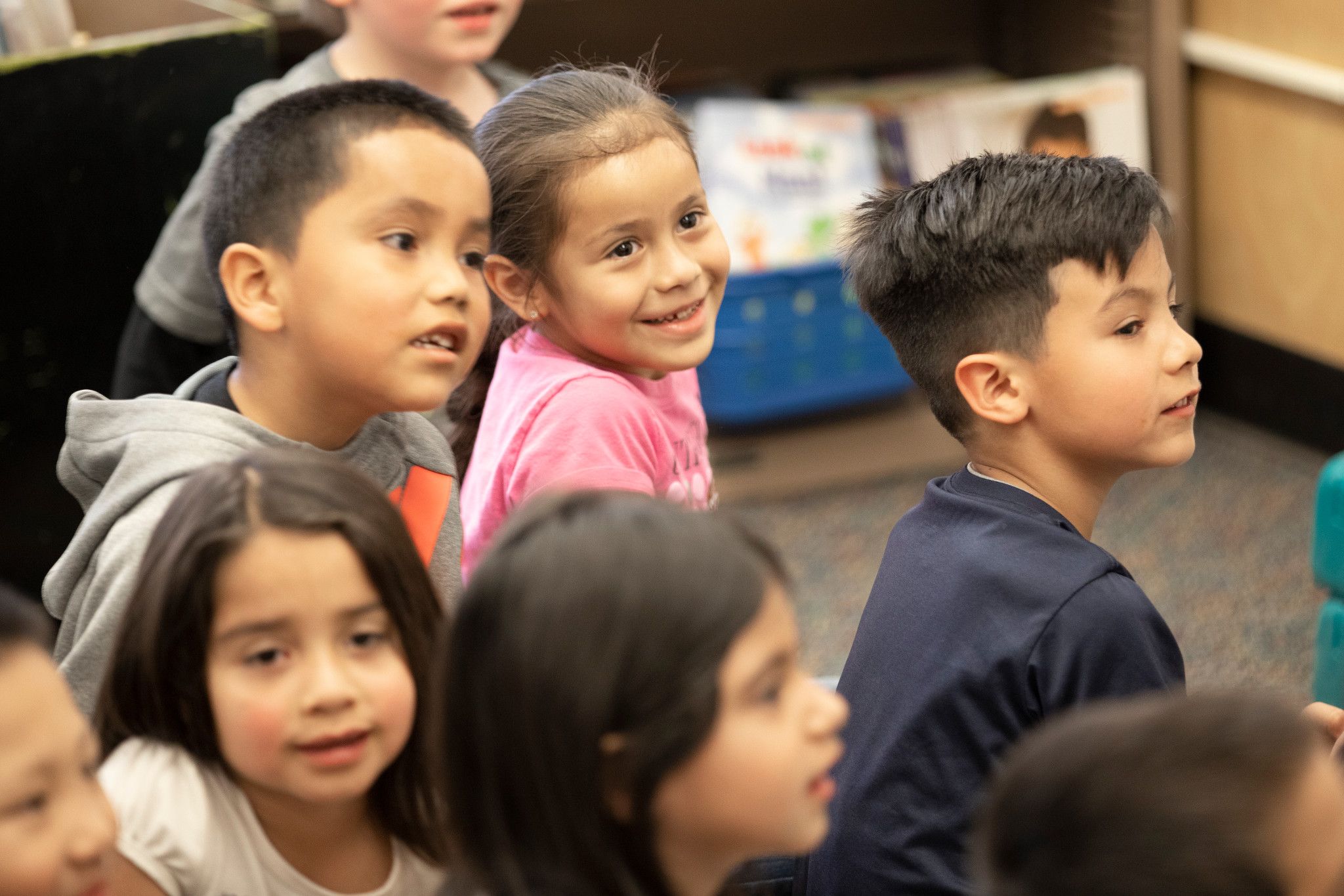 Multicultural kids are engaged in the classroom