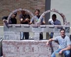 NAU Construction Management students posing with their model creation