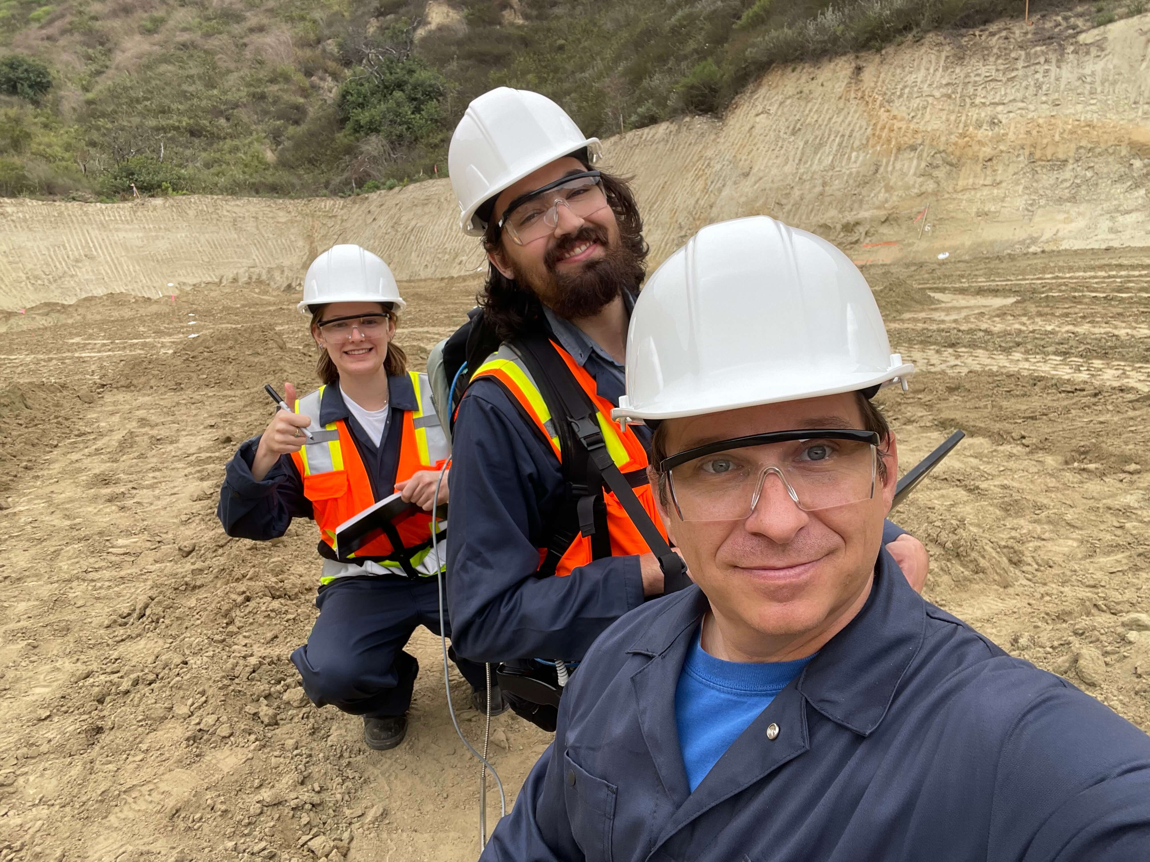 Dede Chapline, Ian Marrs and Christopher Edwards at oil field site.