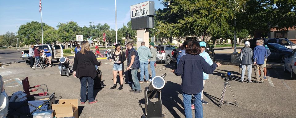 Setting up for eclipse observing at the Roswell Public Library.