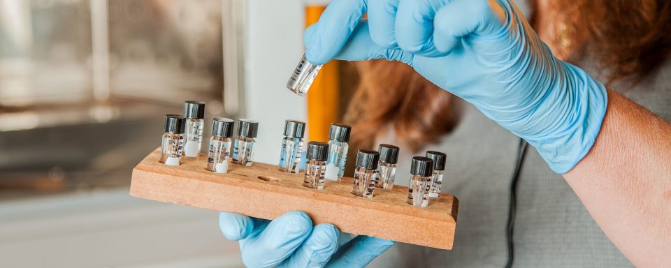 vials being held by student