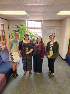 Scholarship winners Joce Dolezal and Morgan Wood pose with art history book prize winner Mckenzi Monical and with Associate Teaching Professor Dr. Becky Pratt-Sturges