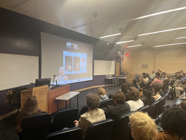 An audience gives their rapt attention to a zoom presenter