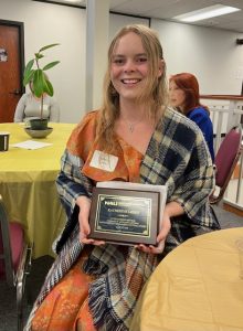 CCS Outstanding Senior Katherine Leddy poses with her award. 