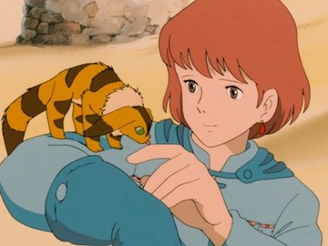 Scene from Nausica of the Valley of the Wind showing small animal on boys shoulder