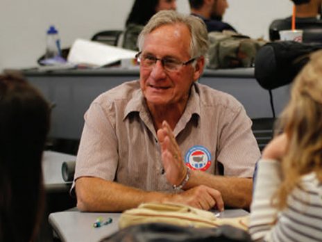Jim Manley teaching to a couple of students.