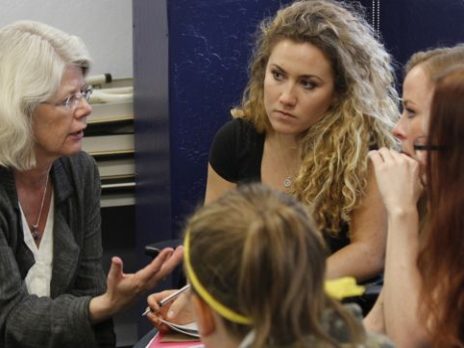 professor kosso engages in discussion with students