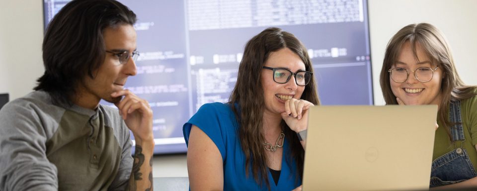 Dr. Morgan Vigil-Hayes, Associate Professor of Computer Science and Gumerman Professor in Honors works with students