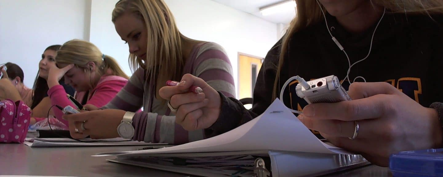 Undergraduate students participate in compiling datum for an IHD research class