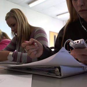 Undergraduate students participate in compiling datum for an IHD research class