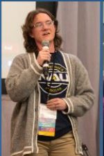 Ernest Elkins talking into a mic