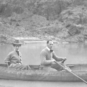 Ellsworth Kolb with woman in a canoe on the Colorado River