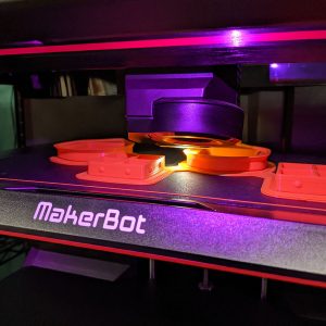Objects being 3D printed using MakerBot Replicator printers at the Cline Library MakerLab