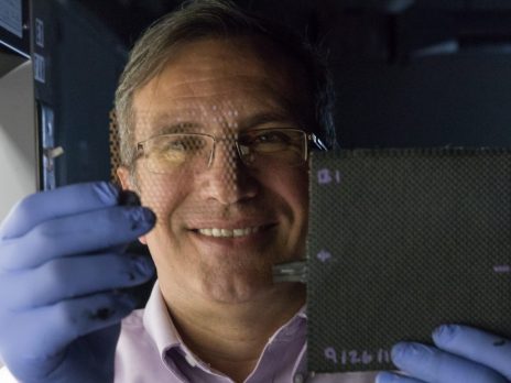 photo of a man holding engineering equipment
