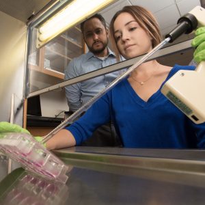 Student in Lab with Scientific Equipment