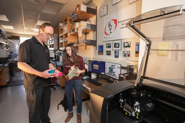 Josette Vigil and Dr. Tim Becker in the BDL lab