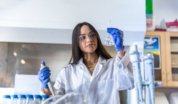 Mitzzy Lopez working in lab