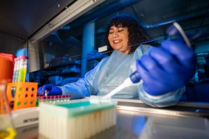 Kaitlyn Parra working in the PMI lab.