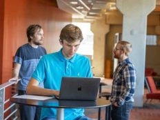 Reilly Leudde working on a computer