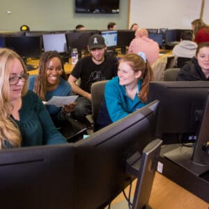 Students collaborating with each other.