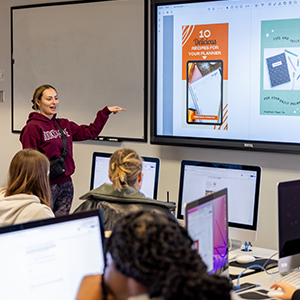 Student at work presenting in the classroom