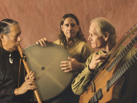 Wild Boys trio shown with flute, drum, and multi neck guitar