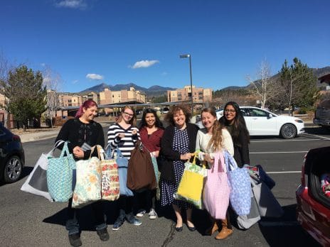 Students Picking up Wellness Kits donated by CUDDLE outreach from director Linda Dodds