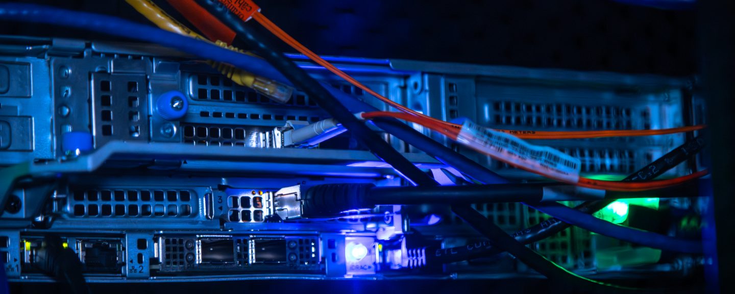 A dark image of lights from a server