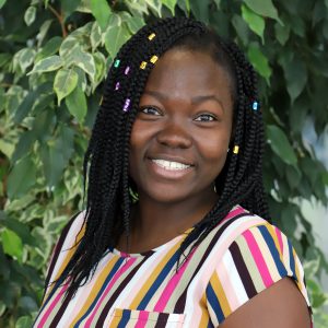 Rebecca Annorbah smiling for a photo.