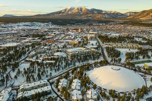 drone overview of NAU campus during a snowy day