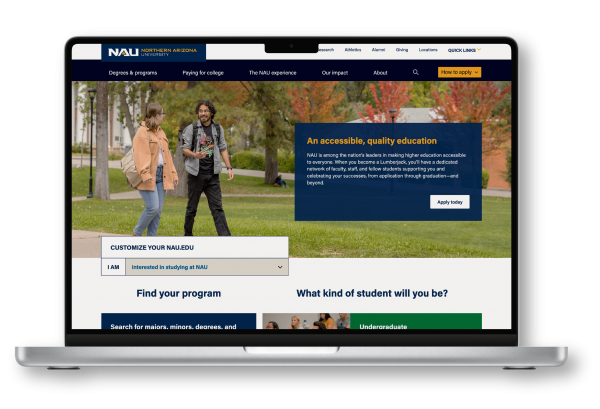 A laptop with the NAU website on screen.