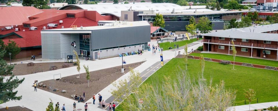 NAU students walking around Student Union in central area of campus.