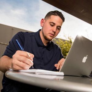 Student looking at a laptop
