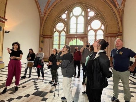 group of travelers with MSI in a church in Europe