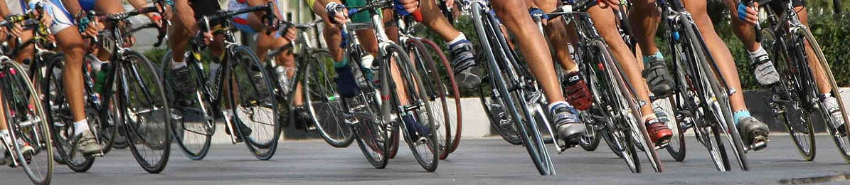 legs and bicycle wheels in motion