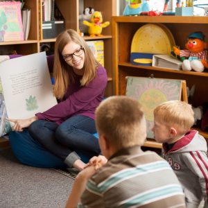 coe-student-teacher-reads-to-children