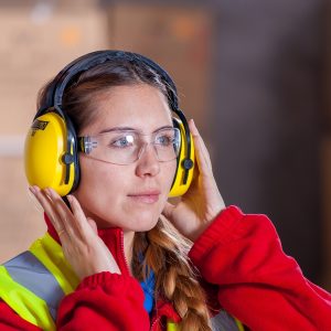 Women with ear and eye protection for working safely