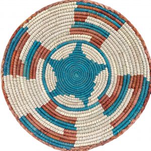 Copper and turquoise Native American basket with star in the center and right angle designs surrounding it