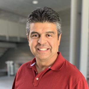 Photo of Tomas Nuno in a red polo