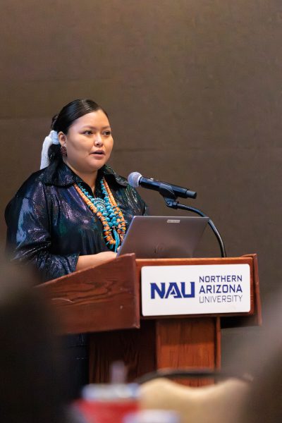 Joyceline Greymountain speaking at the 3rd annual AICHEF event