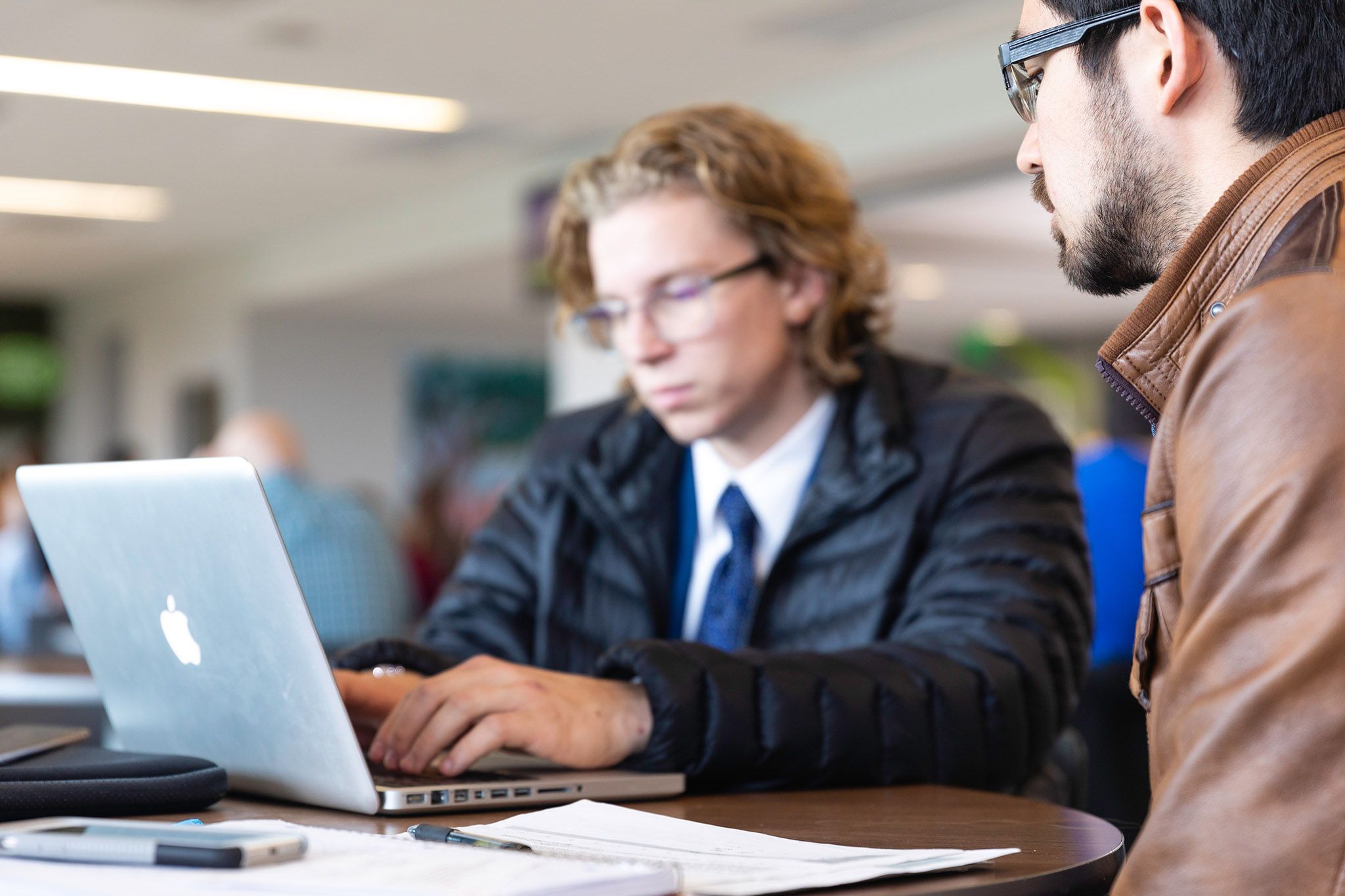 Students working on computers in the Writing Commons.