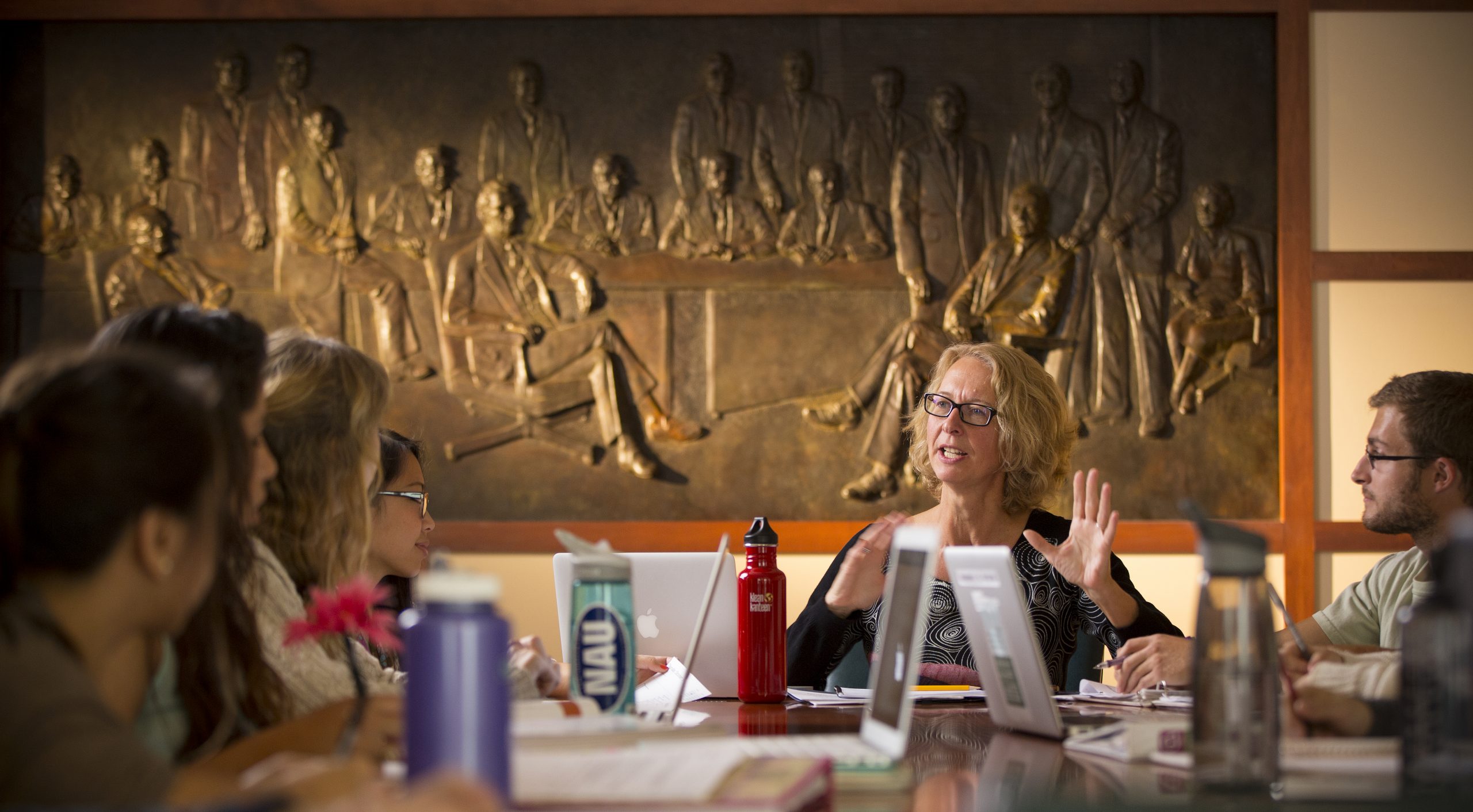 Conference meeting between NAU faculty.