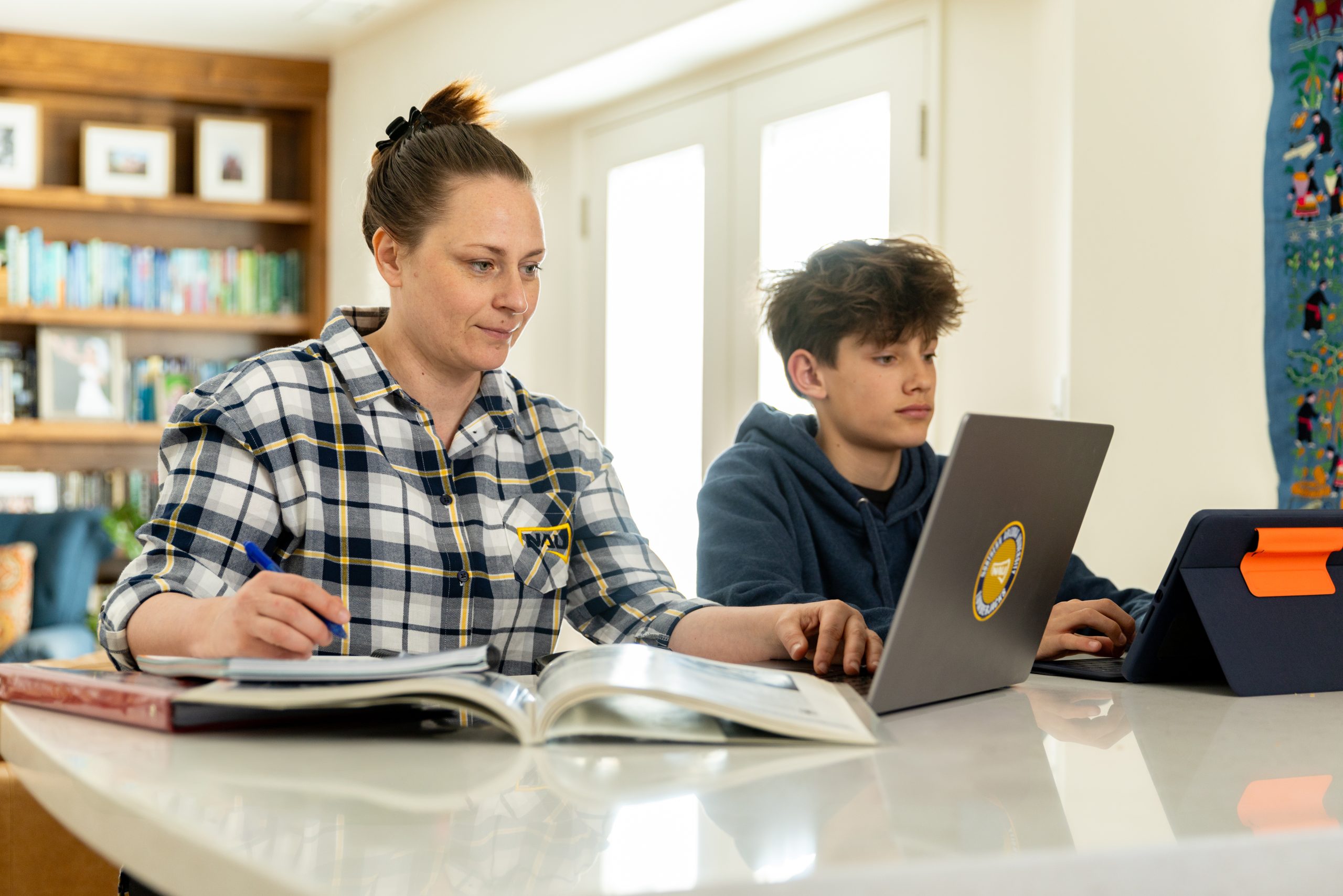 online learners in a home setting with a kid and dog