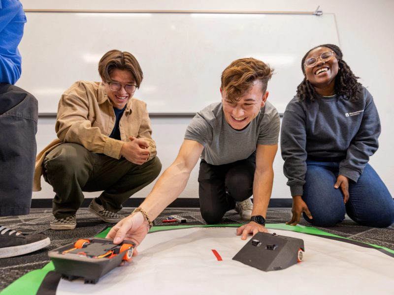 N A U engineering students work together on a project.