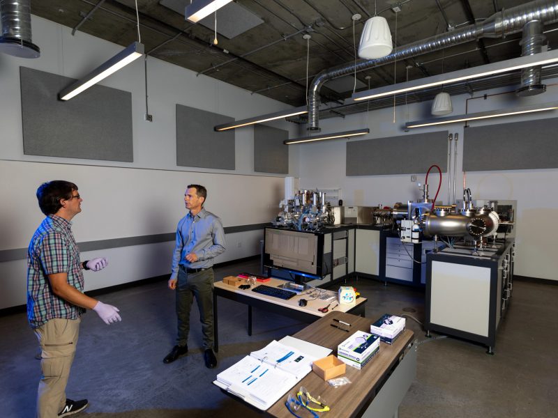 N A U professors working in lab together.