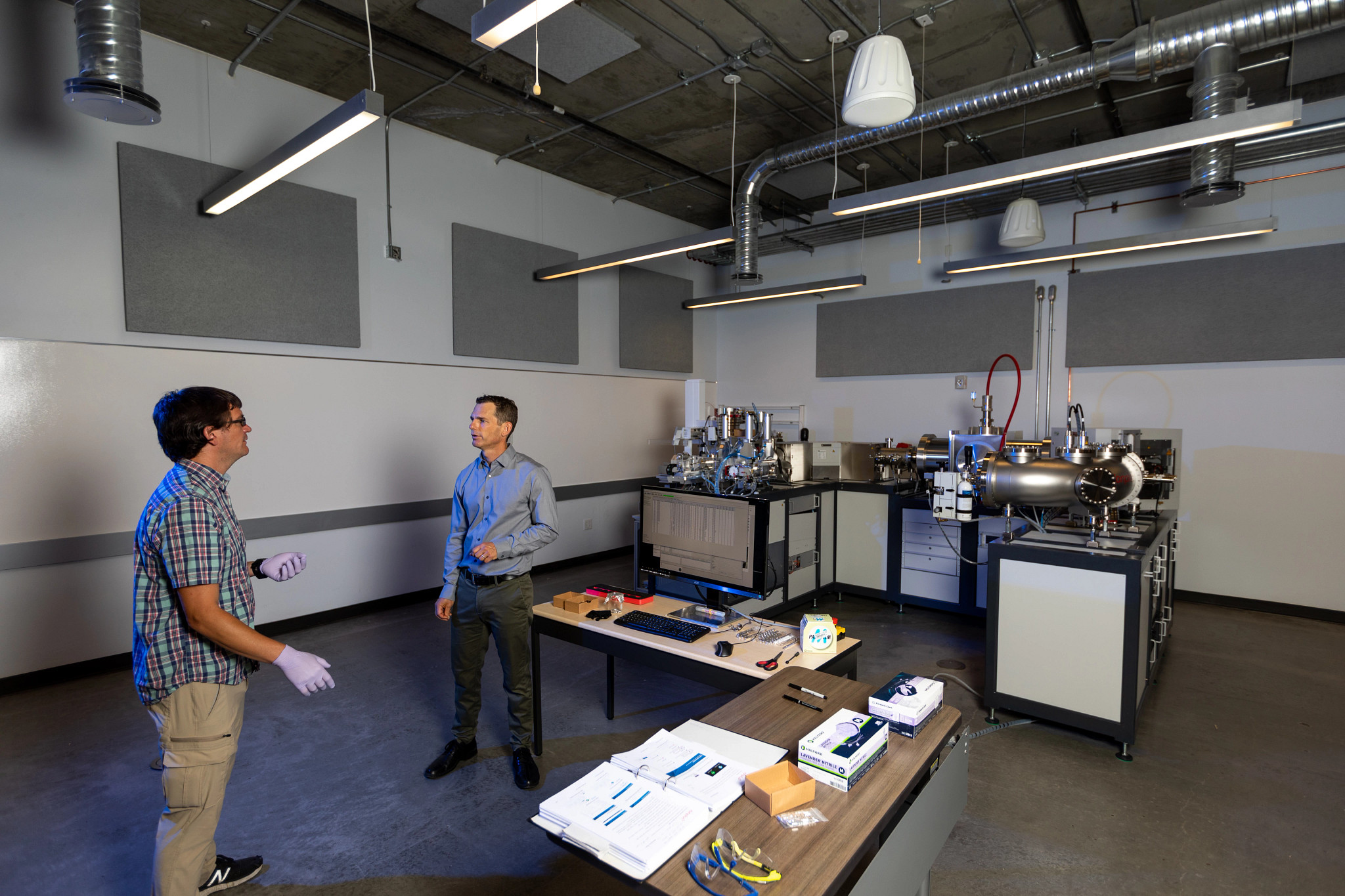 N A U professors working in lab together.