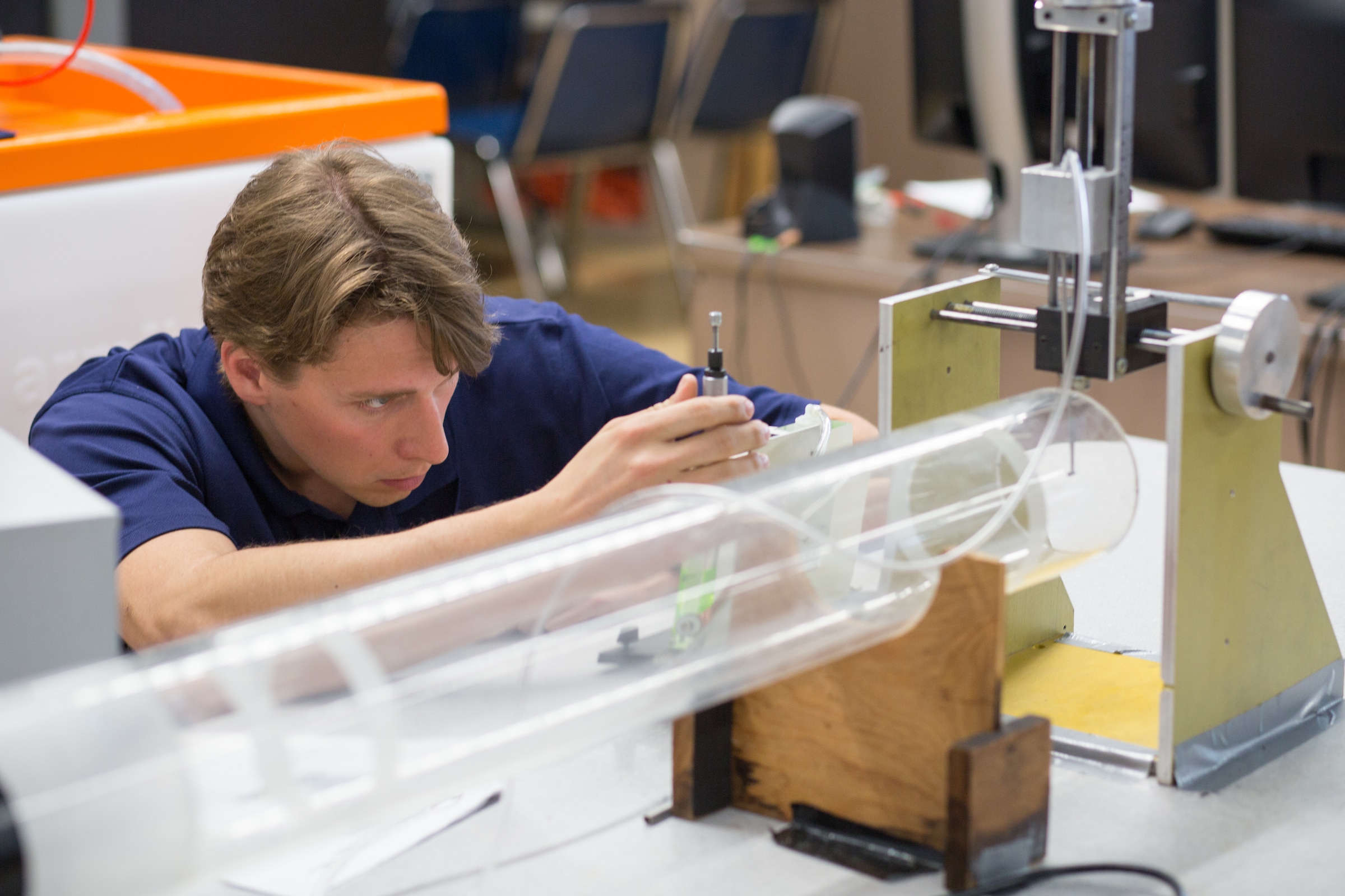 Mechanical engineer student working on project.